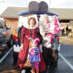 Photo courtesy Shawna of Cuyahoga Falls, OH, who writes, "I looked at our car and saw a dragon. So I did a medieval theme. I was the Queen,my husband was a knight, and my daughters were the court jester and pink dragon. We had a smoke machine in the trunk and we won the best display of the night!"